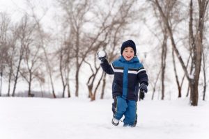 Photo of a boy in winter-کاماپرس